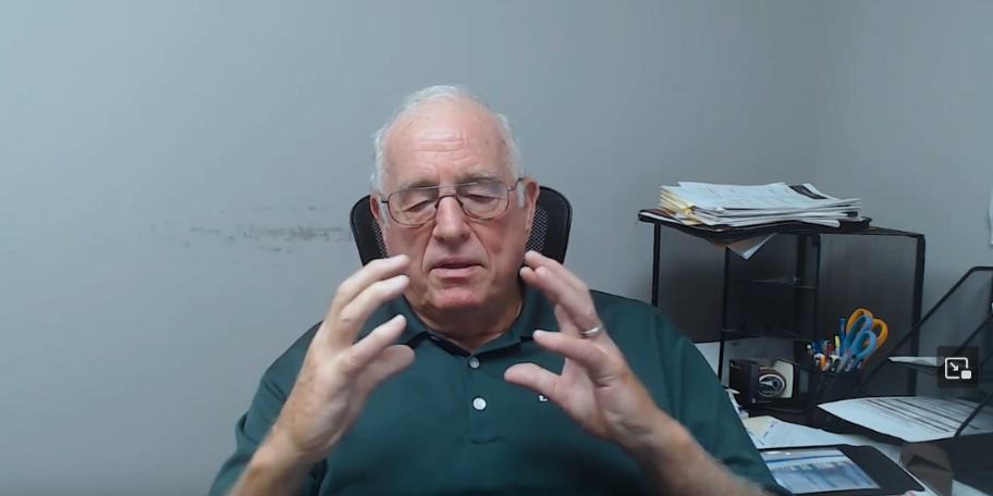 rick-demonstrating-or-explaining-the-direct-mount-actuator-innovation.png